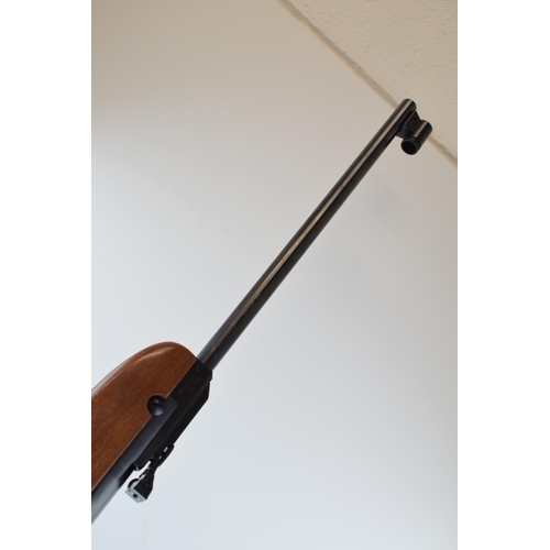 509 - A .177 calibre air rifle by WEIHRAUCH made in Germany. Length 100cm. Together with canvas gun slip.