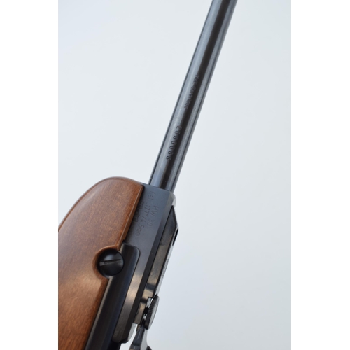 509 - A .177 calibre air rifle by WEIHRAUCH made in Germany. Length 100cm. Together with canvas gun slip.