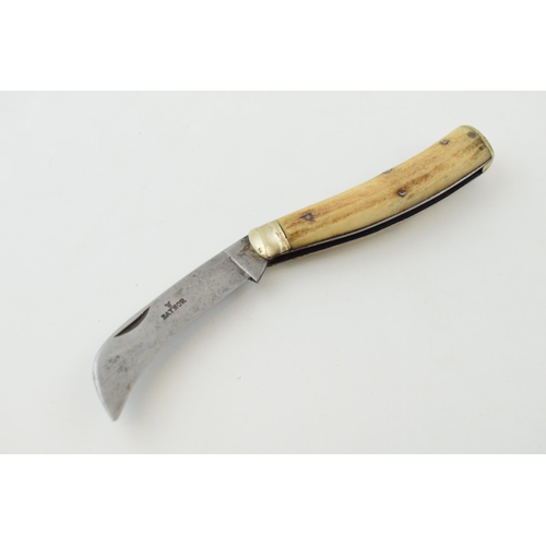 512 - Saynor bone handled antique flatcap penknife, 10.5cm long, 17.5cm when unfolded.