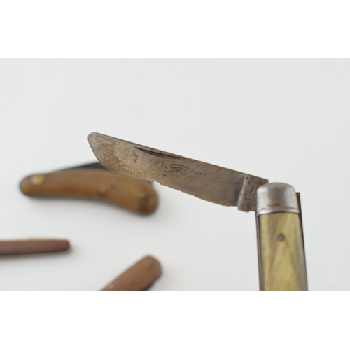 518 - A collection of wooden handled pocket knives to include good examples by Joseph Rodgers, Taylors Eye... 