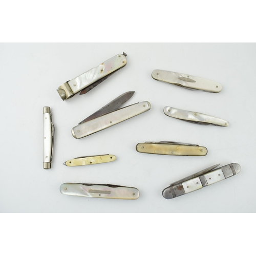 520 - A collection of mother of pearl handled penknives, pipe tempers and pocket knives to include single ... 