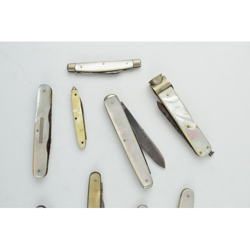 520 - A collection of mother of pearl handled penknives, pipe tempers and pocket knives to include single ... 