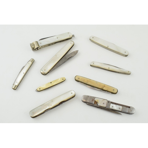 520 - A collection of mother of pearl handled penknives, pipe tempers and pocket knives to include single ... 