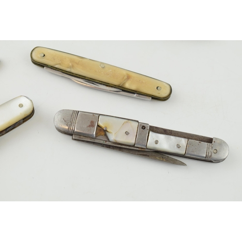 520 - A collection of mother of pearl handled penknives, pipe tempers and pocket knives to include single ... 