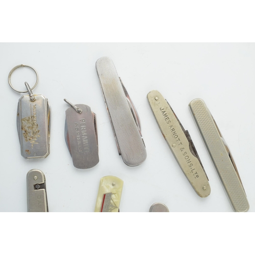 521 - A collection of vintage advertising pocket knives by Sheffield makers including T. Turner, John Watt... 