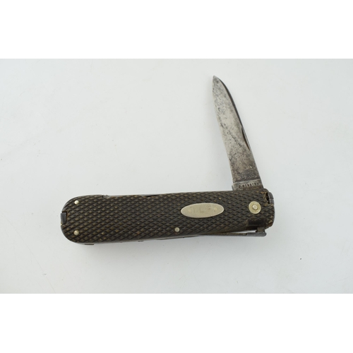 528 - A multitool pocket knife by J Gibbins and Sons of Sheffield. Length 11.5cm.