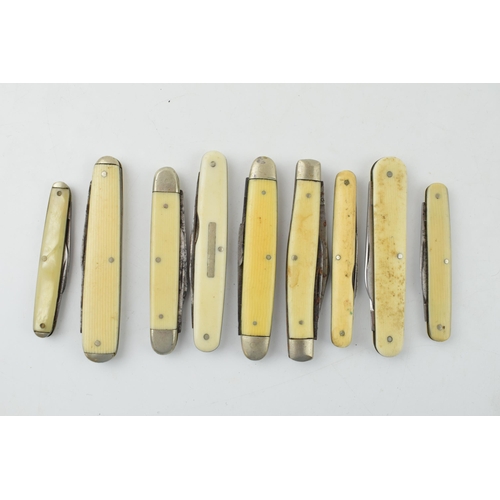 530 - A collection of antique and vintage bone and celluloid handled pocket knives to include Sheffield ma... 