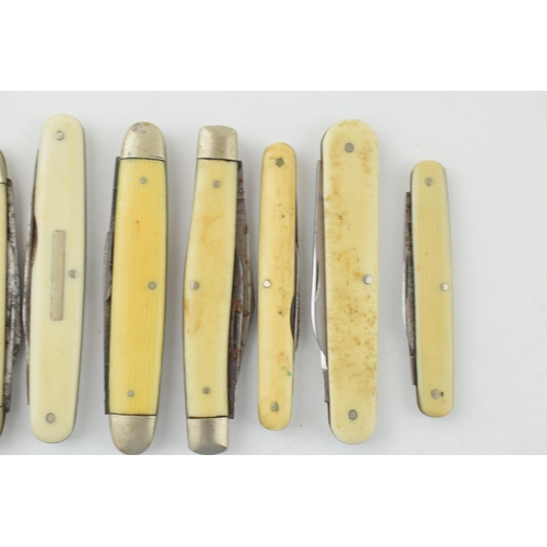 530 - A collection of antique and vintage bone and celluloid handled pocket knives to include Sheffield ma... 