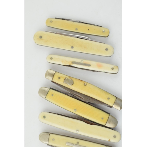 530 - A collection of antique and vintage bone and celluloid handled pocket knives to include Sheffield ma... 