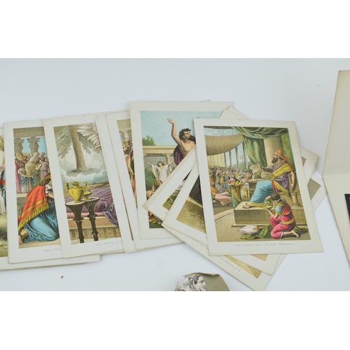 444A - A collection of vintage greeting cards and scraps including 42 biblical scenes, including one hand p... 