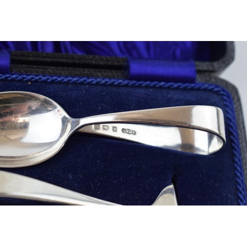 314G - Boxed silver christening set, pusher and a spoon, 46.4 grams.