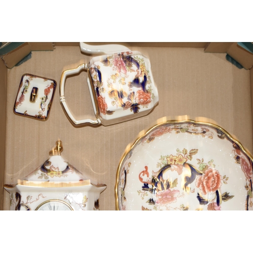 96A - Masons Pottery in the Blue Mandalay pattern to include a bowl, a clock, a small square teapot and ot... 