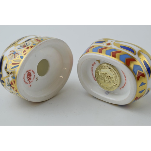 44 - Two Royal Crown Derby Paperweights, Millennium Bug, red marks on the base, gold stopper and Blue Lad... 