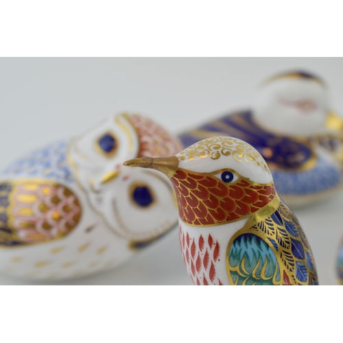 55 - Four Royal Crown Derby Paperweights, Hummingbird, White Swan, Owl and Duck, last three have a red Ro... 