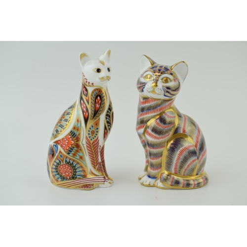 66 - Two Royal Crown Derby paperweights, Siamese Cat, 13.5cm high, produced 1996 to 2001, decorated in a ... 