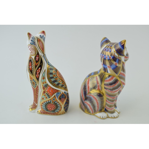 66 - Two Royal Crown Derby paperweights, Siamese Cat, 13.5cm high, produced 1996 to 2001, decorated in a ... 