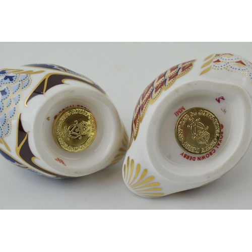 8 - Two Royal Crown Derby paperweights, Swimming Duckling and Sitting Duckling, gold stoppers and red pr... 