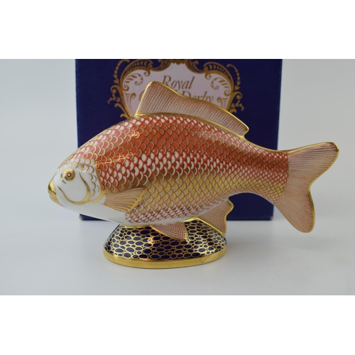 Royal Crown Derby paperweight, Golden Carp with gold stopper and red Royal Crown Derby stamp on the base, boxed.