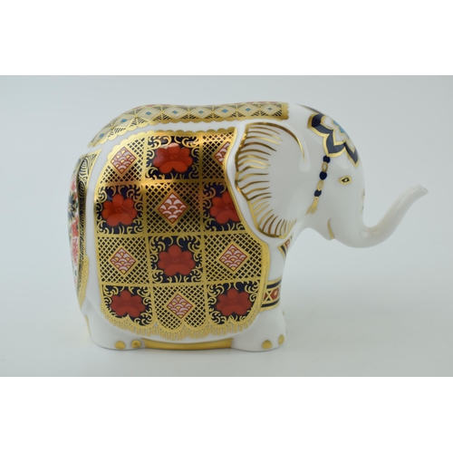 96 - Royal Crown Derby paperweight, Elephant with trunk raised, decorated in the 1128 Imari palette, silv... 