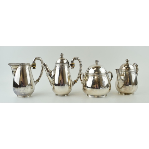 564 - A silver plated Italian military coffee set, circa 1938, to include a coffee pot, a hot water jug, a... 