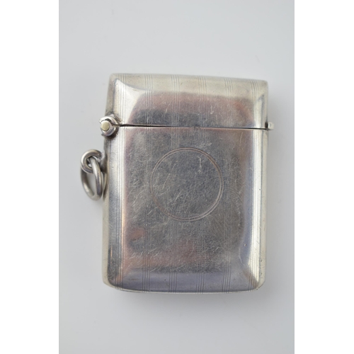 572 - Hallmarked silver vesta case, vacant cartouche, Birmingham 1914, 26.8 grams.