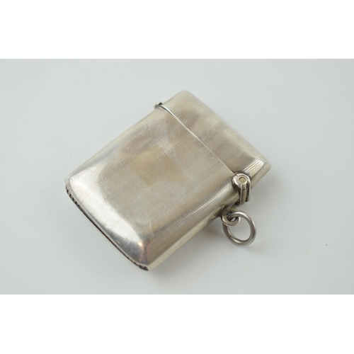 572 - Hallmarked silver vesta case, vacant cartouche, Birmingham 1914, 26.8 grams.