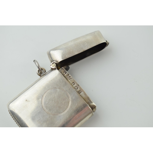 572 - Hallmarked silver vesta case, vacant cartouche, Birmingham 1914, 26.8 grams.