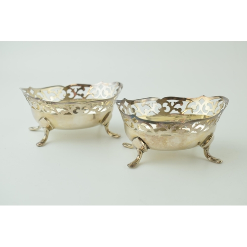 583 - Hallmarked silver pair of sweet dishes, ornately designed, Sheffield 1968, 10cm wide, 128.7g (2).