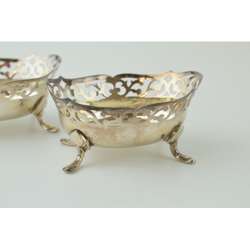 583 - Hallmarked silver pair of sweet dishes, ornately designed, Sheffield 1968, 10cm wide, 128.7g (2).