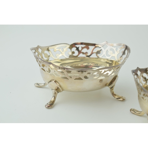 583 - Hallmarked silver pair of sweet dishes, ornately designed, Sheffield 1968, 10cm wide, 128.7g (2).