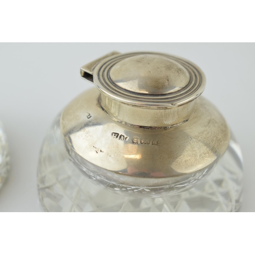 590 - A pair of hallmarked silver and glass inkwells, a pair, with glass liners, Birmingham 1903, 8cm wide... 