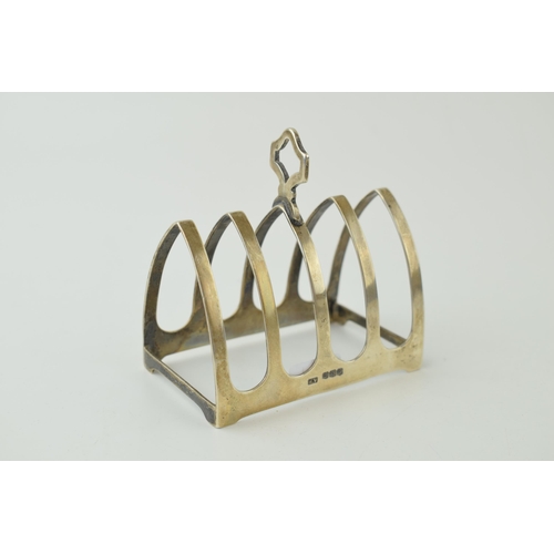 594 - Hallmarked silver 5 bar toast rack, 55.4g, 8cm wide, Sheffield 1931.