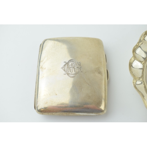 596 - A silver cigarette case, monogram to front, Chester hallmark, with a shaped edge sweet dish, Birming... 