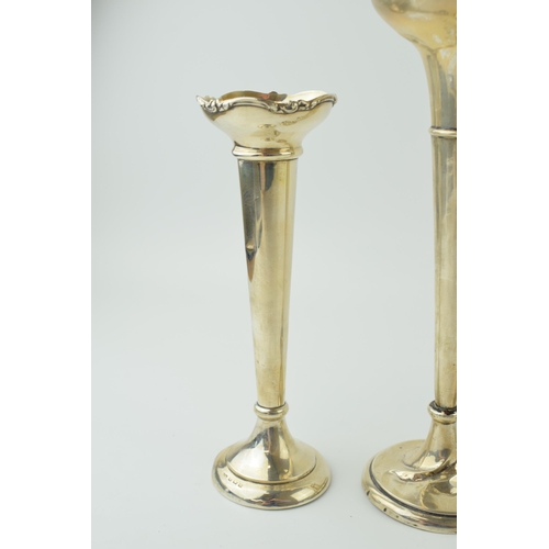 597 - A pair of loaded silver bud vases, ornate rims, 18cm tall, Birmingham 1919, with a larger bud vase, ... 