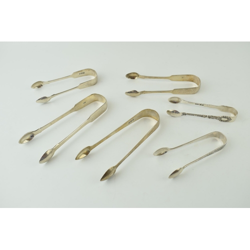 601 - A collection of silver sugar tongs / nips to include Georgian and later examples, 208.5g (6 pairs).