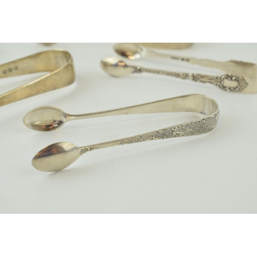 601 - A collection of silver sugar tongs / nips to include Georgian and later examples, 208.5g (6 pairs).