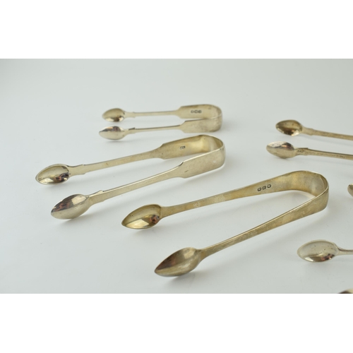 601 - A collection of silver sugar tongs / nips to include Georgian and later examples, 208.5g (6 pairs).