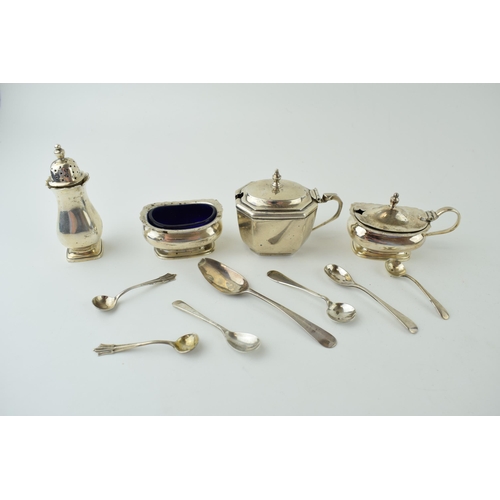 607 - Silver to include a three piece cruet set, with liners, Birmingham 1937, with a single mustard pot a... 