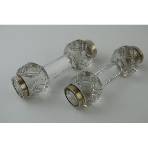 619 - A pair of silver and glass knife rests, Birmingham 1907, H C Davis, 11cm wide (2).