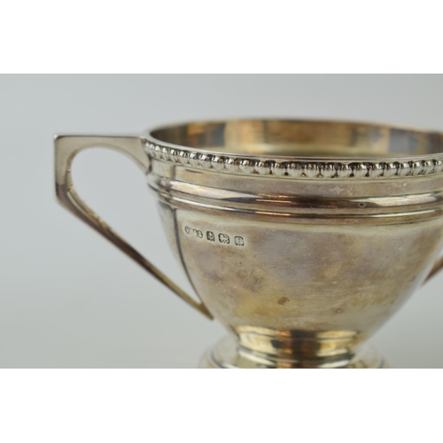 636 - Silver two handled cup / sugar bowl, 142.3g, Birmingham 1930.