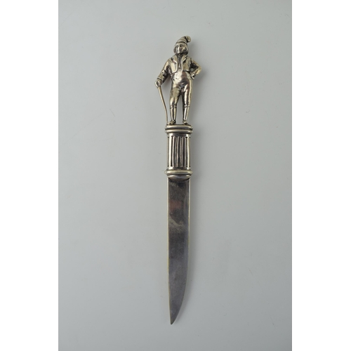 638 - Silver 830 letter knife with figural finial, 32.6g, stamped 'H Móller Trondhjem, 15cm long.