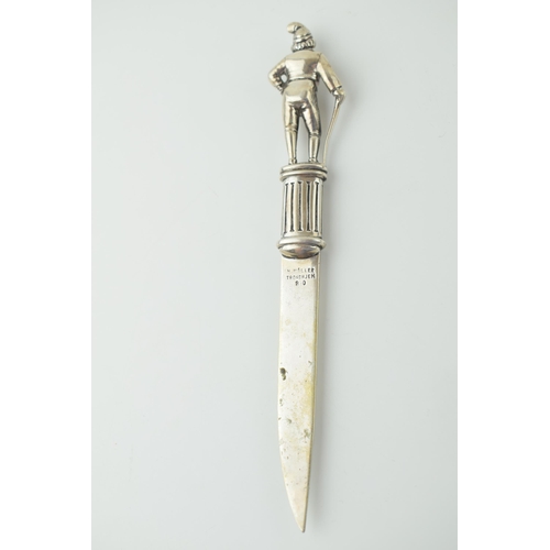 638 - Silver 830 letter knife with figural finial, 32.6g, stamped 'H Móller Trondhjem, 15cm long.