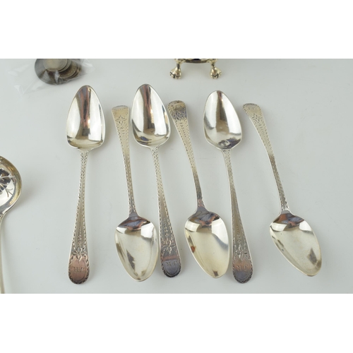 640 - Silver to include a set of six bright cut Georgian tea spoons, a silver sugar sifter spoon and a sil... 