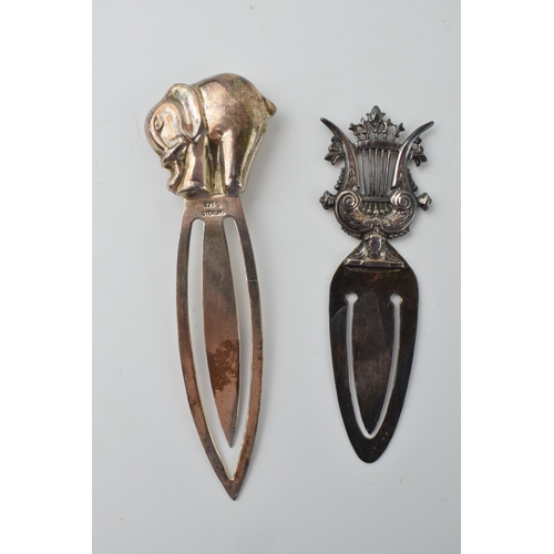 644 - Two sterling silver bookmarks, one in the form of an a
elephant. Height 9cm. Weight 15.7 grams. (2)