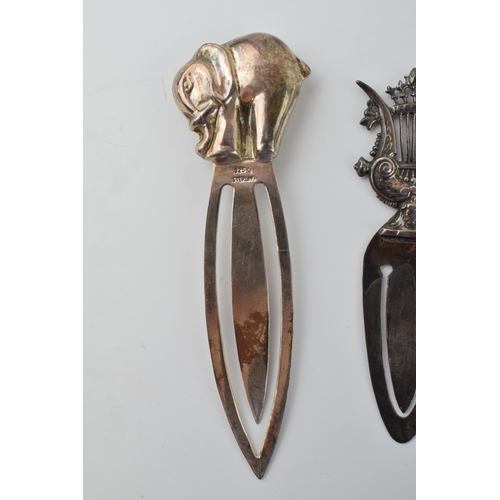 644 - Two sterling silver bookmarks, one in the form of an a
elephant. Height 9cm. Weight 15.7 grams. (2)