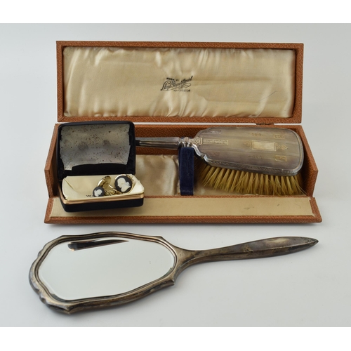 650 - A cased silver brush with traditional design, with a similar hand mirror and Wedgwood Jasperware cuf... 