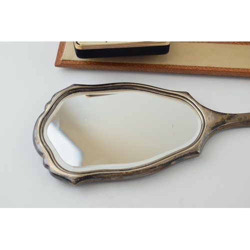 650 - A cased silver brush with traditional design, with a similar hand mirror and Wedgwood Jasperware cuf... 