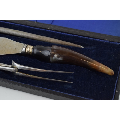 651 - Superior Cutlery of Sheffield horn handled three piece carving set in fitted case, with silver colla... 