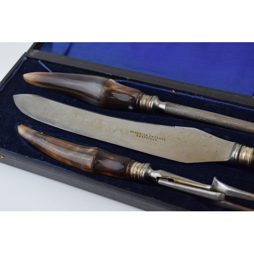 651 - Superior Cutlery of Sheffield horn handled three piece carving set in fitted case, with silver colla... 