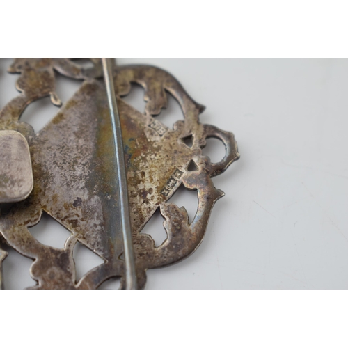 652 - Silver nurses ornate belt buckle, Birmingham 1959, 35.6g.